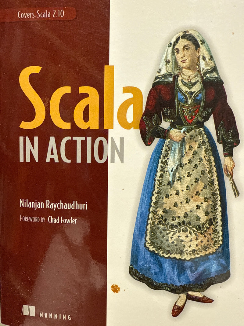 Bok om Scala-programmering, "Scala in Action (Pocket)", vist med omslag og tittel i en boklig miljø.