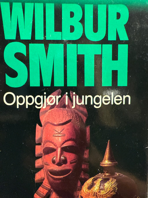 Oppgjør i jungelen (Innbundet) - Bokia.no