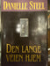 Den lange veien hjem (Innbundet) - Bokia.no