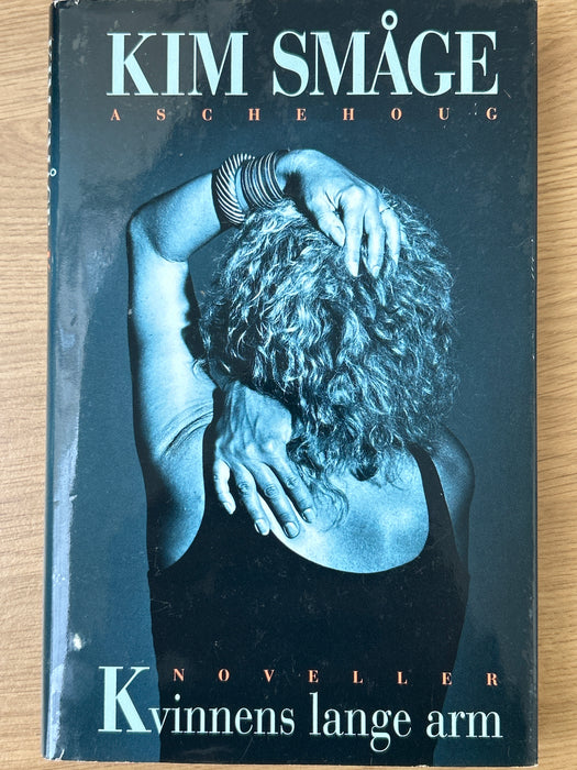 Kvinnens lange arm (Innbundet) - Bokia.no