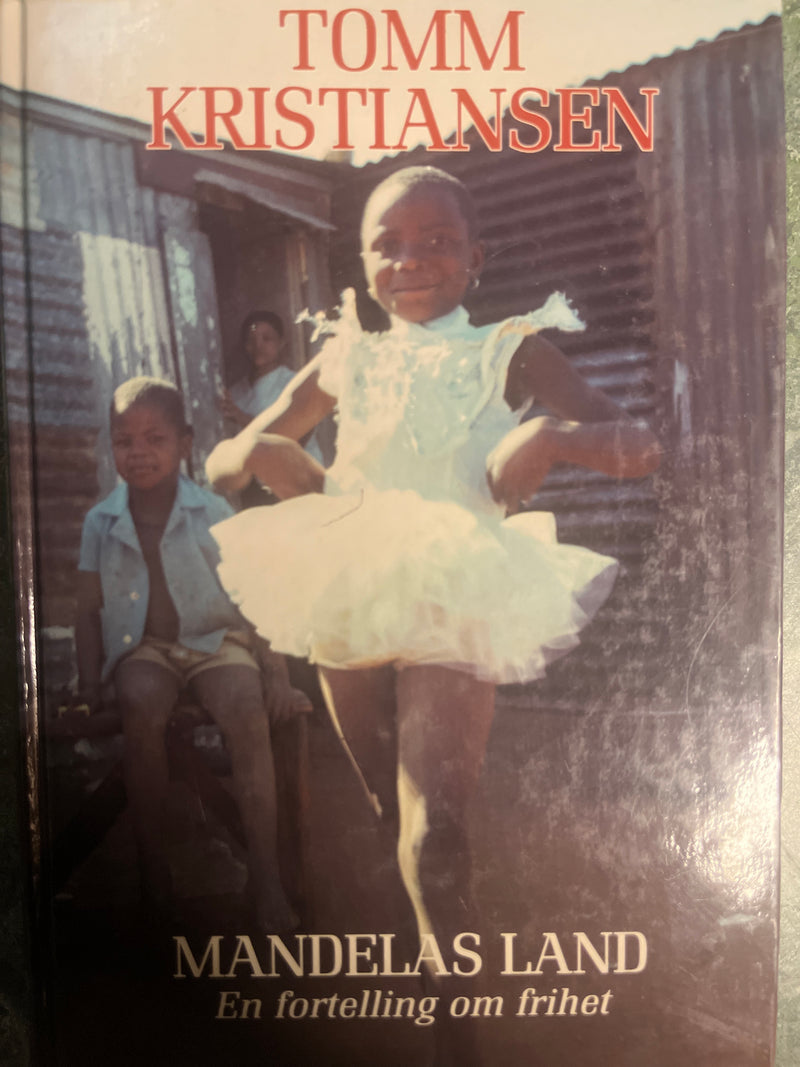 Bokomslag for "Mandelas land" av Cappelen Damm AS, norsk sakprosa for voksne, med tittel og illustrasjon.