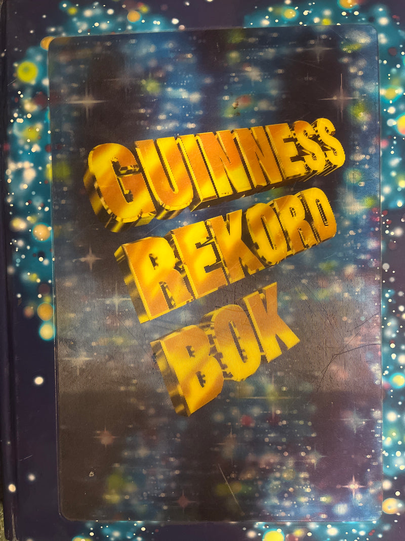Guinness rekordbok 1998 innbundet, utgave fra Forlaget Vigmostad & Bjørke AS, viser forsiden med Guinness-logo og innbinding