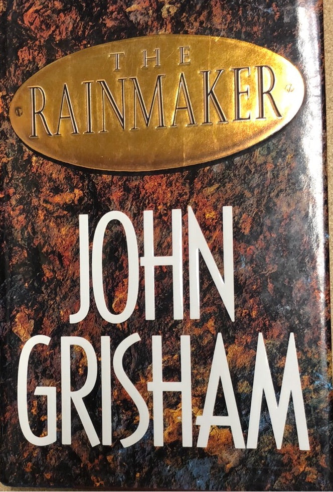 Bok Rainmaker av Bokia.no, innbundet utgave med omslag, viser bokomslag med tittel og grafisk design, fokus på coverdetaljer.