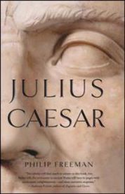 Pocketbok om Julius Caesar av Bokia.no, viser en åpen bok med titler og illustrasjoner på forsiden
